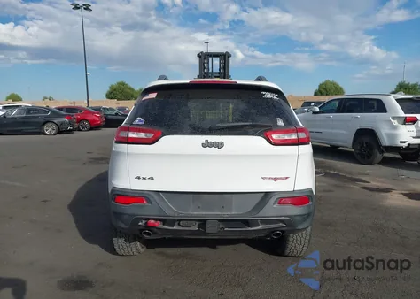 2014 Jeep Cherokee Trailhawk from USA, damaged, VIN 1C4PJMBS5EW321439